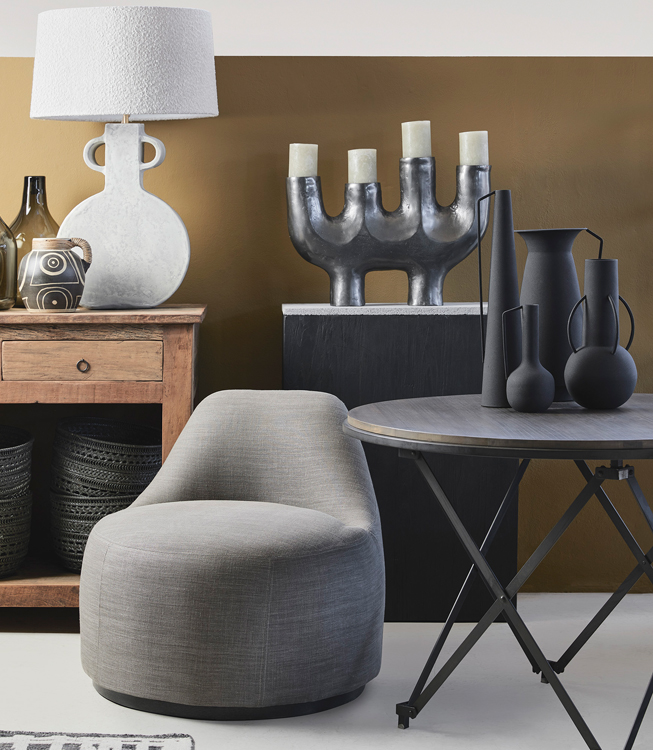 Vase Roman black lifestyle image black metal vase