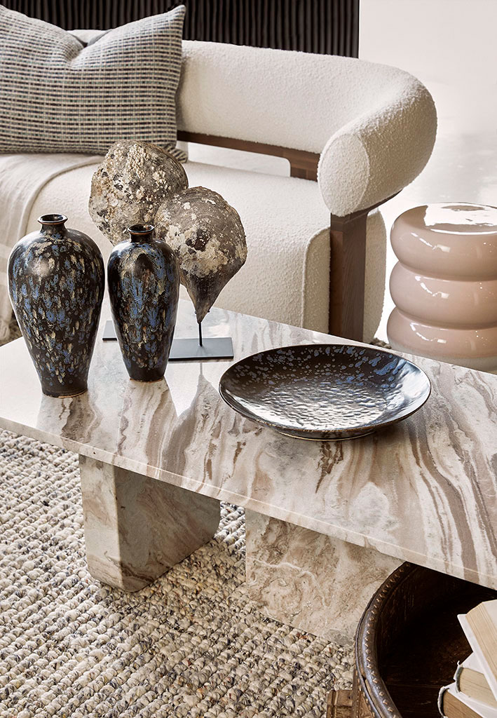 Marble coffee table with unique decor accessories