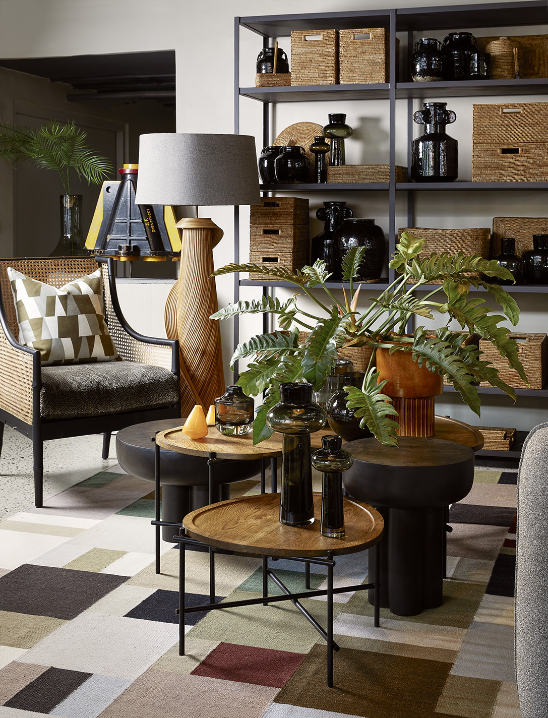 Showroom setting rattan baskets and floor lamp