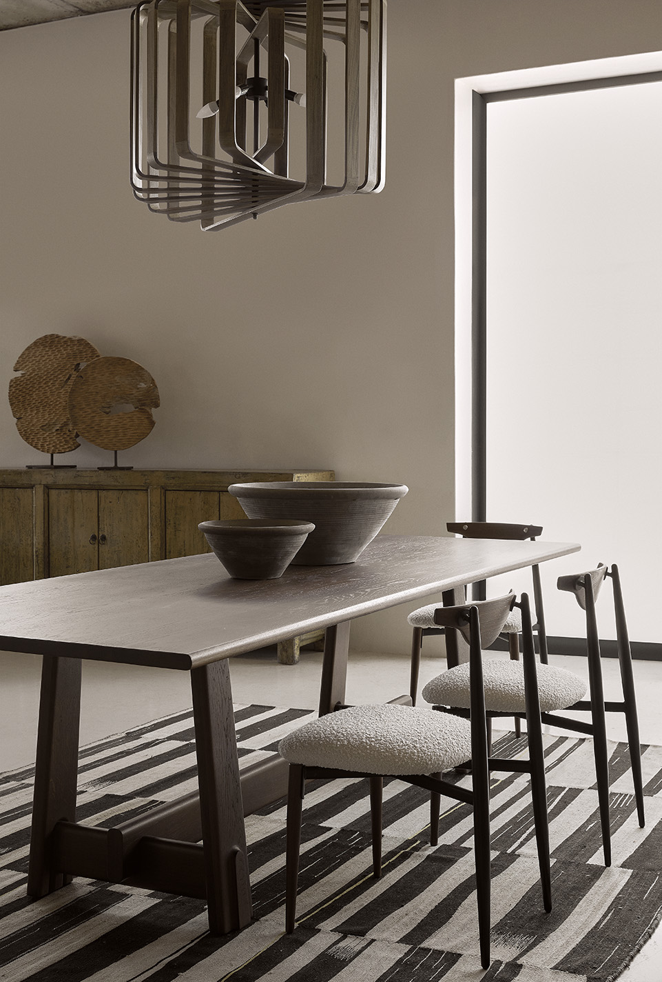Odette Dining Table and Vicuna Dining Chairs in Showroom setting